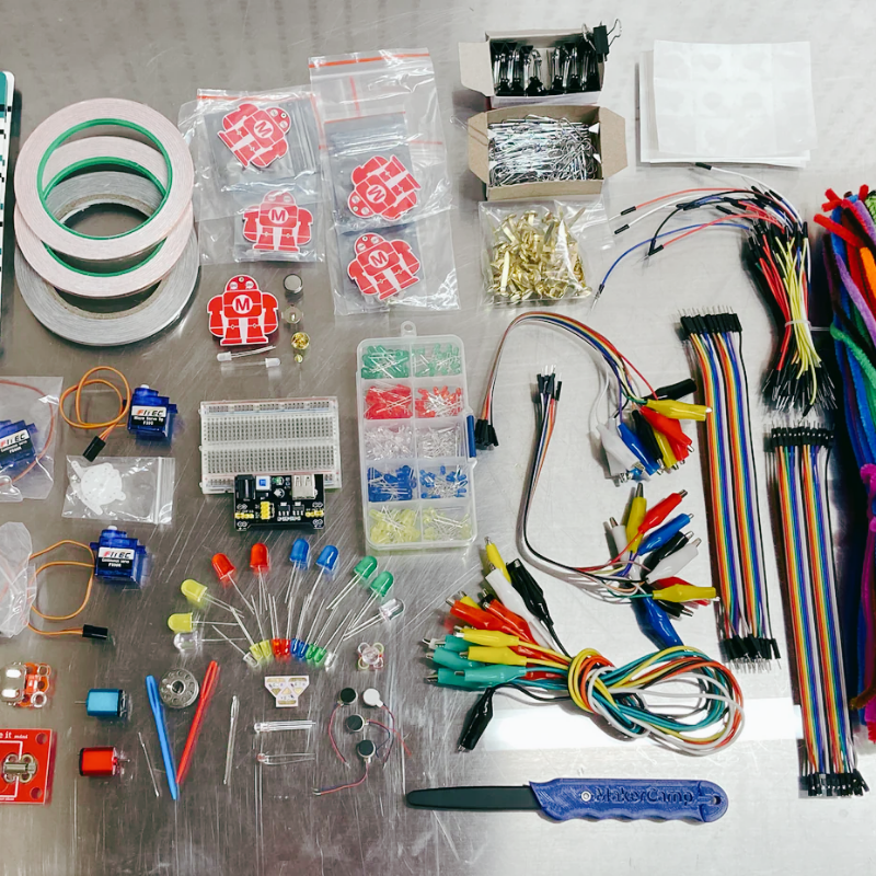 Selection of craft supplies and electronics for projects in the DIY Maker School.