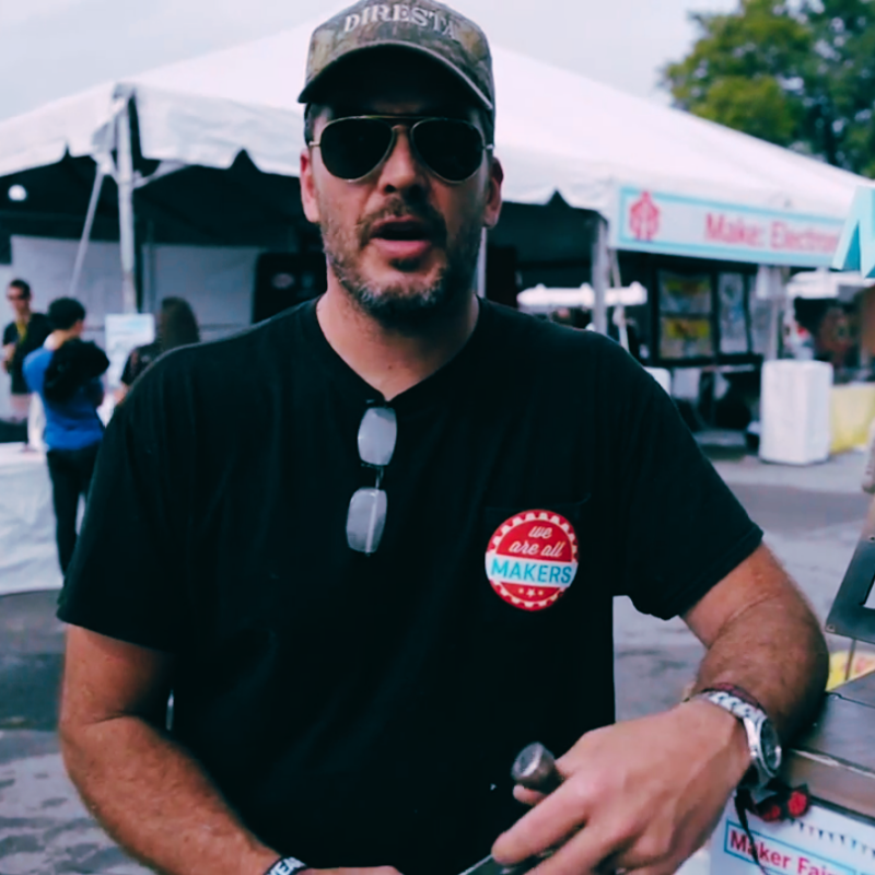 Make Author Spotlight - Jimmy DiResta at a maker event wearing sunglasses and a baseball cap.