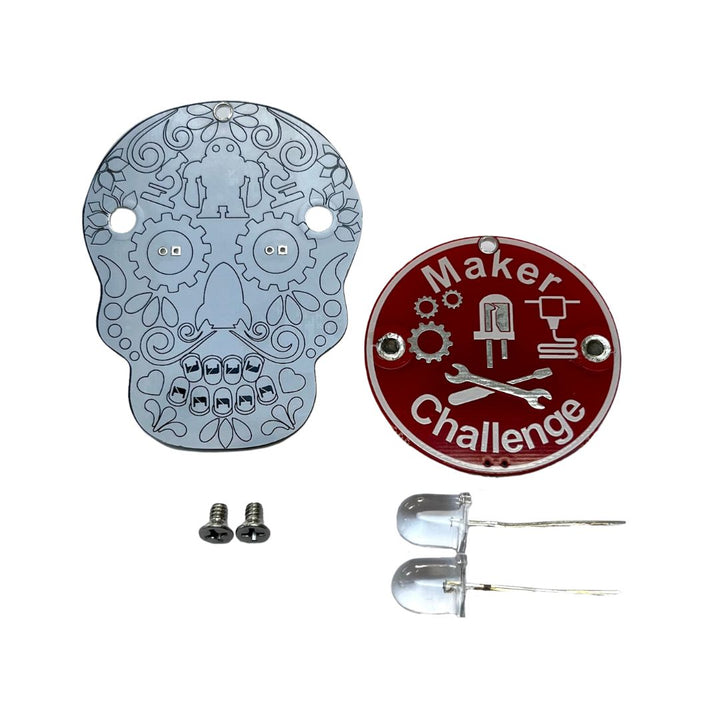 Learn To Solder - Sugar Skull soldering kit components including skull circuit board, red round plate, LEDs, and screws.