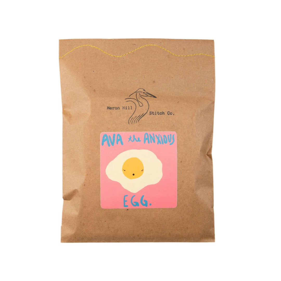 Ava the Anxious Egg Felt Stitching Kit packaging featuring cute egg design on craft paper.