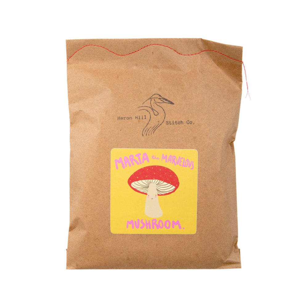 Marta the Marvelous Mushroom Felt Stitching Kit packaging featuring a whimsical mushroom design.