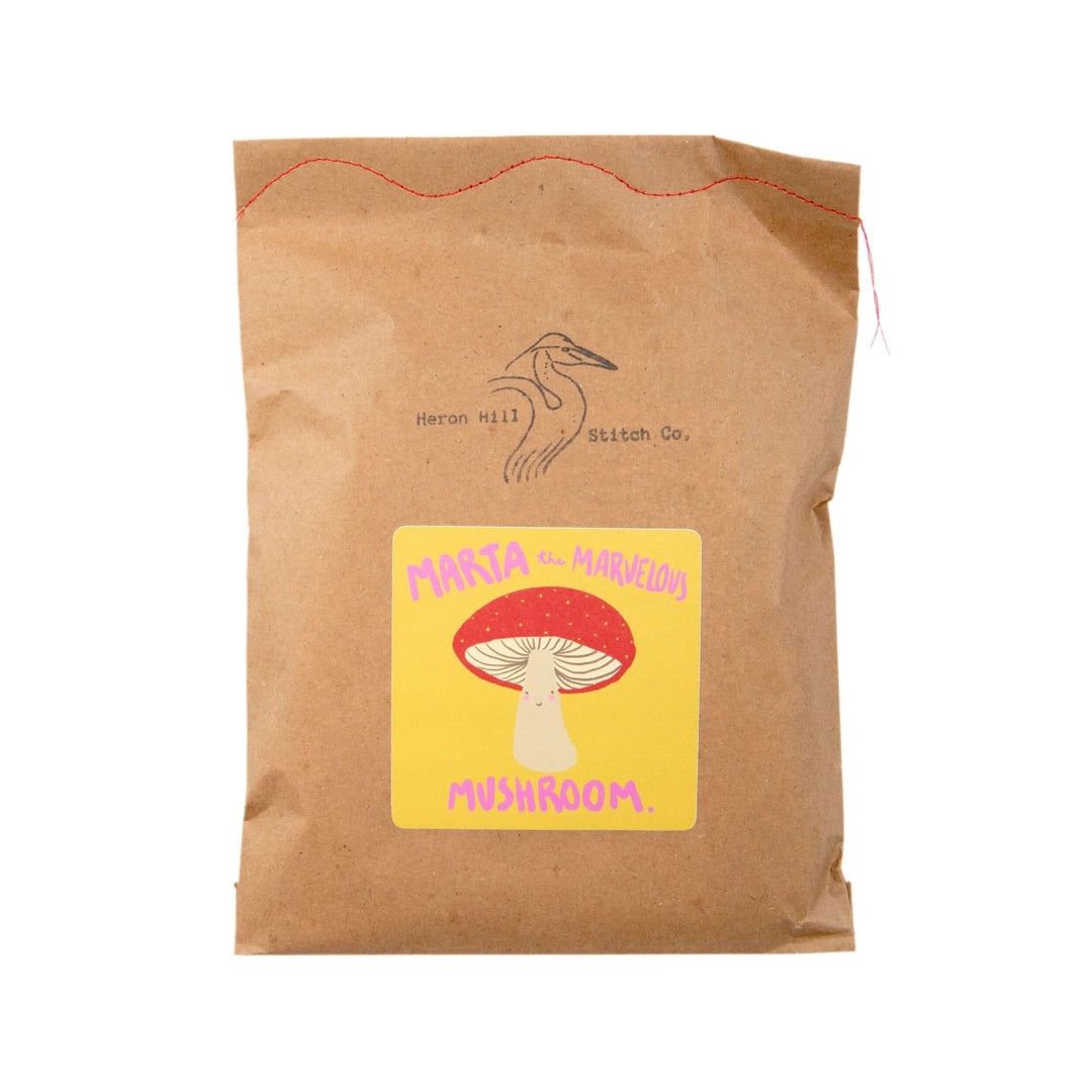 Marta the Marvelous Mushroom Felt Stitching Kit packaging featuring a whimsical mushroom design.
