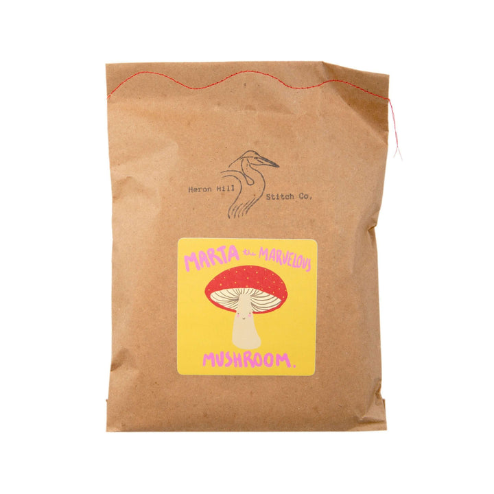 Marta the Marvelous Mushroom Felt Stitching Kit packaging featuring a whimsical mushroom design.