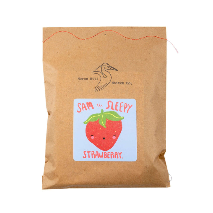 Sam the Sleepy Strawberry Felt Stitching Kit packaging featuring a cute strawberry design.