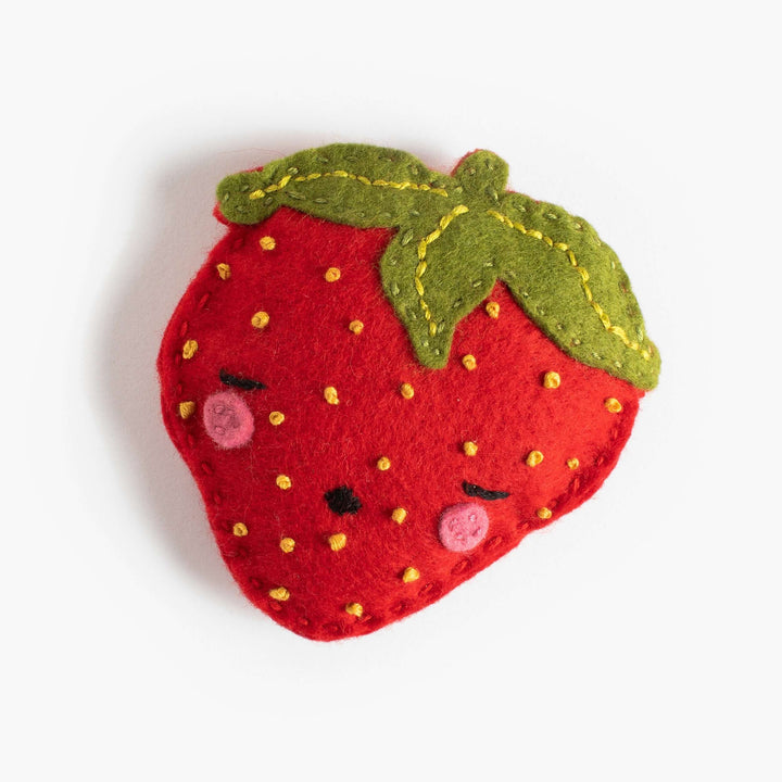 Sam the Sleepy Strawberry Felt Stitching Kit - cute plush strawberry with sleepy eyes and green leaves.